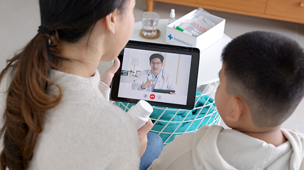 Mother and Child looking at laptop